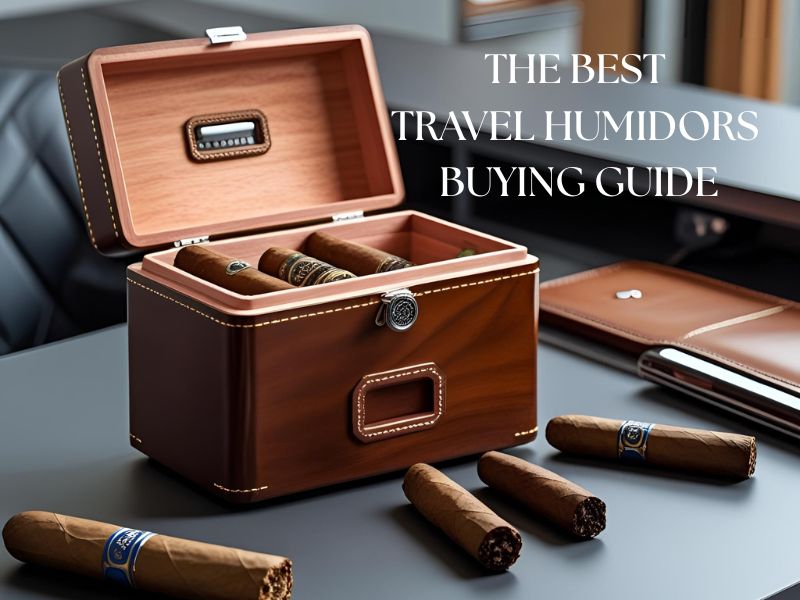 A small travel humidor placed on a desk, surrounded by a few cigars.