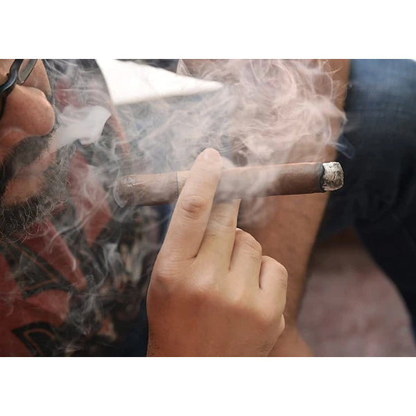 Pereson Smoking a cigar